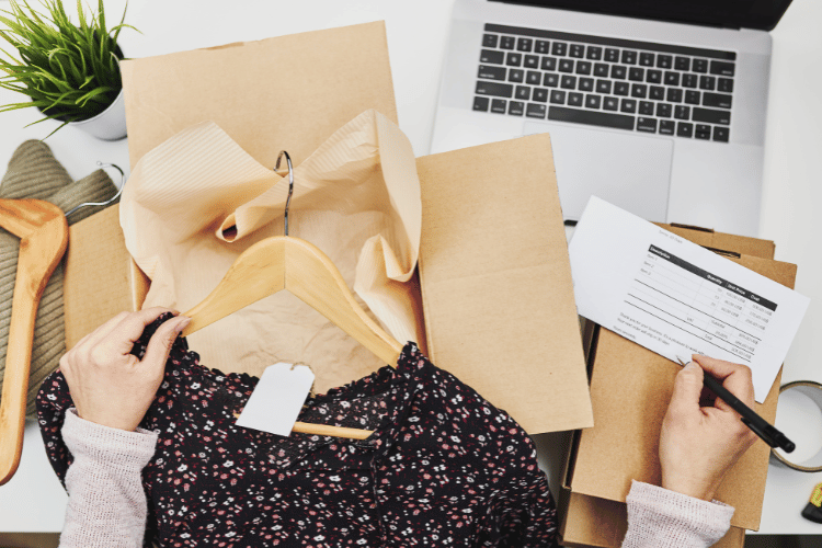 Business owner of online shop packing online order to delivery