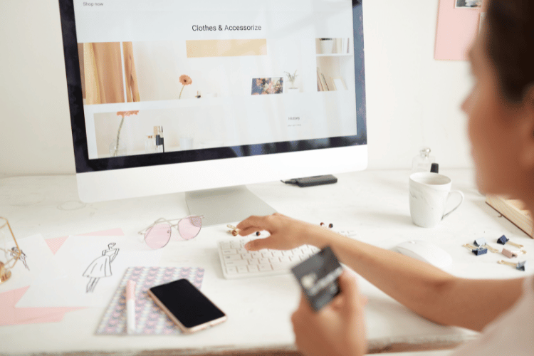 Close-up of a woman ordering clothes online